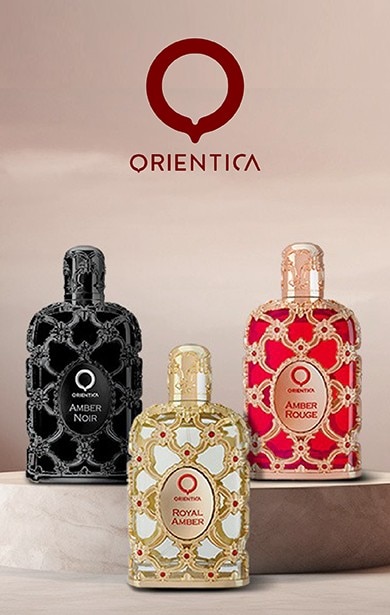 Parfumuri Orientica Amber Noir, Royal Amber și Amber Rouge, în flacoane luxoase cu detalii ornamentale, expuse pe un decor elegant.